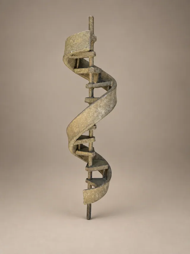 Spiral ribbon sculpture on a rod