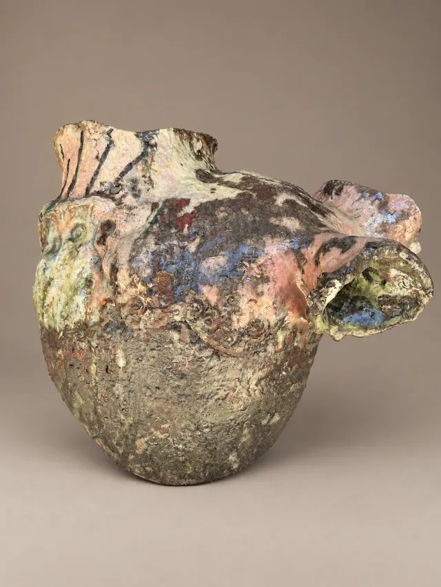 Heart-shaped vessel in earthy pink and grey glazes